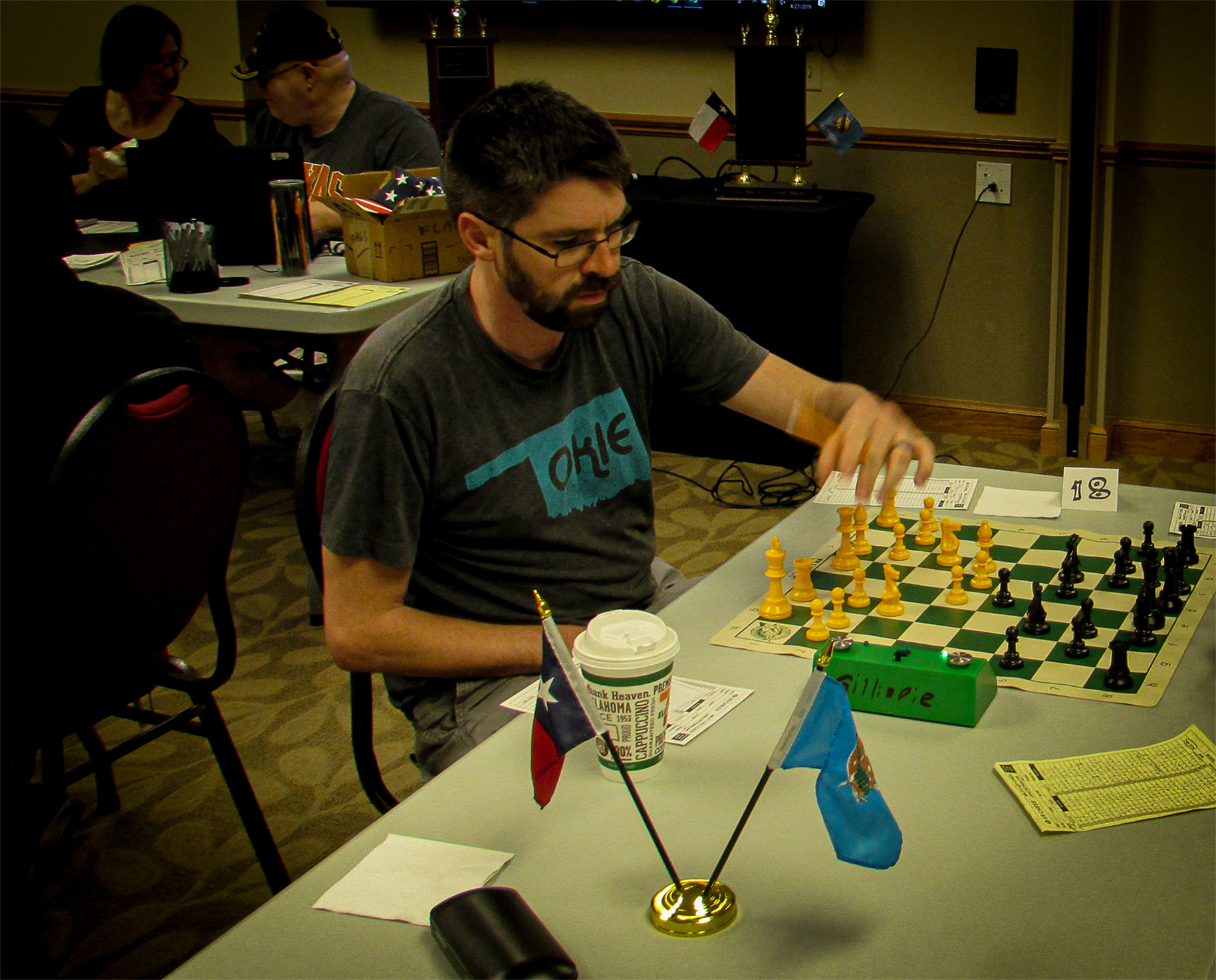 Rookie Ishmael Kissinger hails from Oklahoma City and is a fast rising star for Oklahoma chess.  He played in his first rated tournament only a year ago and sports a solid 55.6 win percentage.  His 2-0 sweep over a tough opponent on Board 18 caught everybody's attention.  Photo by Mike Tubbs.
